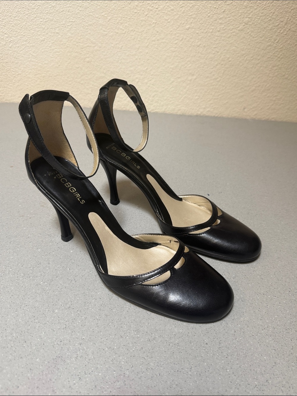 BCBGirls Black Ankle-Strap Cutout Mary Jane Pumps